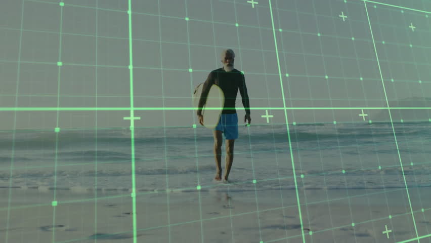 senior male surfer walking barefoot on beach shoreline, showing digital grid overlay for tech demo. Beach, coastal, athletic, modern, outdoor, tranquility, adventure