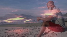 Man practicing meditation on sandy sunset beach, with animated heart icon and health chart overlay. Serenity, relaxation, wellness, mindfulness, landscape, nature, vibrant - Powered by Shutterstock - Get 15% off with code: PIKWIZARD15