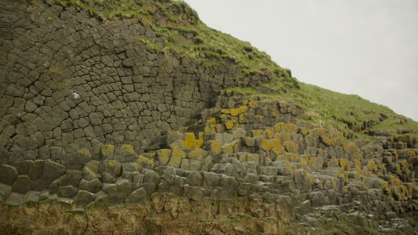 Symphony of stones on the island cliff