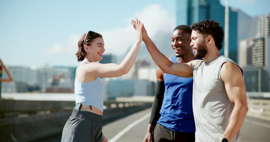 Running, group and friends with watch, high five and check time for exercise with fitness. People, athlete and runner with break for workout, training and wellness for health endurance challenge