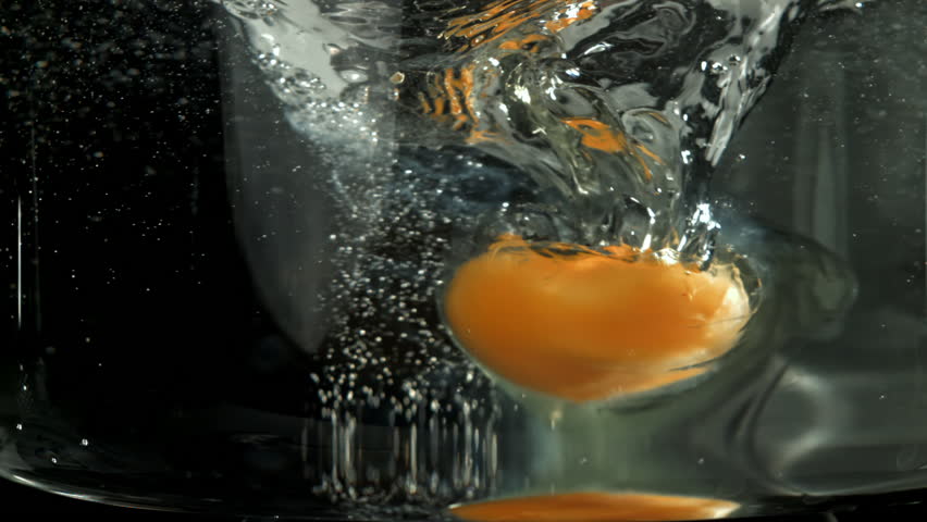Cooking poached eggs. Filmed on a high-speed camera at 1000 fps. High quality FullHD footage