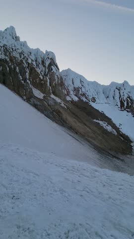 4K high resolution vertical mobile video of Mount Hood in Oregon, showcasing active volcanic fumaroles, rising gases, steam vents, Crater Rock, and Devil