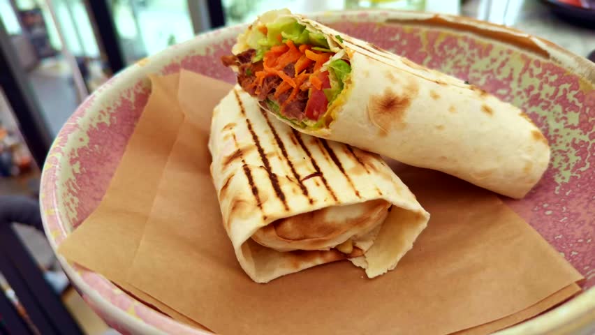 Wrap Doner kebab With Meat. Junk Food Lamb And Lettuce In Tortilla. Fast Food Chicken Shawarma. Beef Gyros. Tasty Arabic Doner Kebab. Traditional Turkish Meal. Greek Gyros Dinner. Grilled Meat In Pita