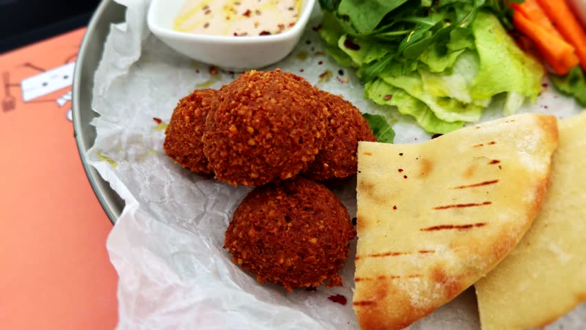 Arab Table. European Appetizer. Lebanese Dinner. Pita With Sauce. Breakfast Turkish Food. Halal Middle Eastern Food. Meze Dish With Falafel. Ramadan Food Lunch Menu. Greek Pitta With Tzatziki Sauce 