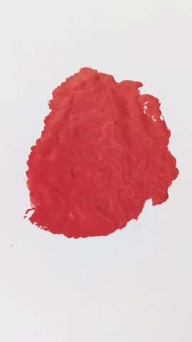 Expired Lipstick Being Used Creatively by Drawing on White Paper in Natural Daylight