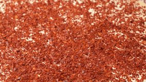 Fresh Chili Peppers Fall Into Crushed Dry Chili Pepper Seasoning Side View Slow Motion. - Powered by Shutterstock - Get 15% off with code: PIKWIZARD15