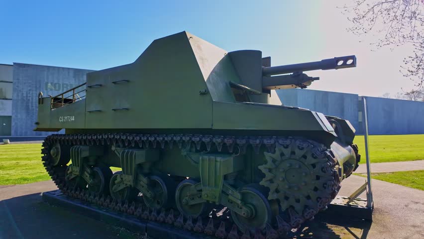 Close-up view of a WWII American tank in open-air military museum display at Omaha Beach, Colleville-sur-Mer, Normandy, France.