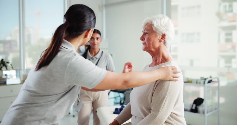 Elderly woman, stretching and physiotherapist on tablet, injury progress and medical report. Senior patient, helping and physiotherapy team with mobility assessment, rehabilitation and healing muscle