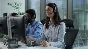 Tired exhausted Caucasian business woman callcenter worker headset touch head suffer headache pain burnout working computer online sales trading helpline multiethnic coworkers work problem call center - Powered by Shutterstock - Get 15% off with code: PIKWIZARD15