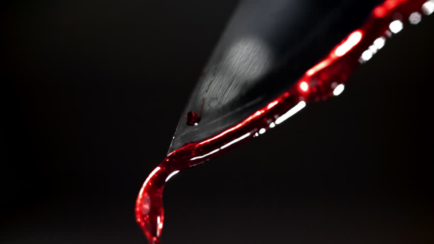 Blood dripping from the knife blade. Filmed on a high-speed camera at 1000 fps. High quality FullHD footage
