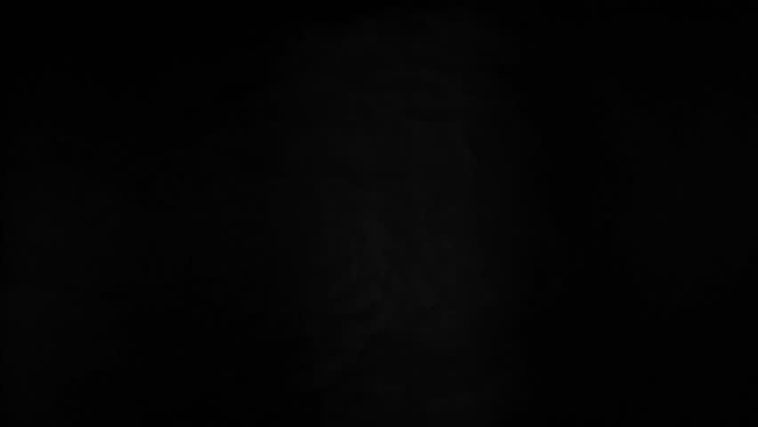 Super Slow Motion Shot of White Powder Explosion Isolated on Black Background . Filmed on High Speed Cinematic Camera at 1000 fps