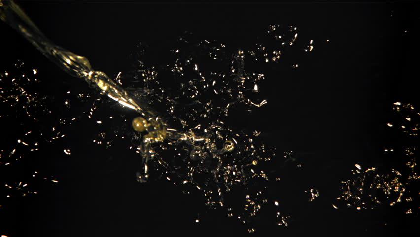 Splashes with drops of olive oil. Filmed on a high-speed camera at 1000 fps. High quality FullHD footage