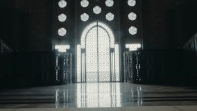 Grand Hassan II Mosque Interior: Sunlight Through Ornate Gate. Stunning Moroccan Architecture and Design. Casablanca Landmark, Islamic Art, and Cultural Heritage. Majestic Ambiance and Spiritual - Powered by Shutterstock - Get 15% off with code: PIKWIZARD15