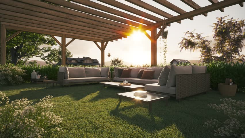 Cozy evening at home in the backyard. Backyard terrace at sunset. Backyard patio with outdoor furniture