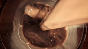 Hot chocolate is poured into a glass. Filmed on a high-speed camera at 1000 fps. High quality FullHD footage - Powered by Shutterstock - Get 15% off with code: PIKWIZARD15