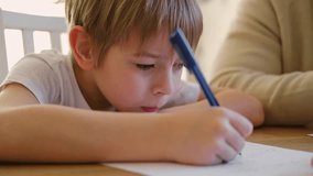 Dad teaches his son writing and counting. Kids primary education. Children learn, study in home school. Daddy male helping teaching little child boy support studying, learning homework. Knowledge day. - Powered by Shutterstock - Get 15% off with code: PIKWIZARD15