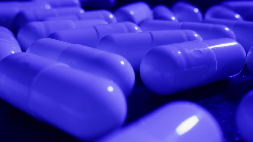 Pills and vitamins macro, Close up view of womans hands holding plenty of different drugs. Painkillers and antibiotics. Healthcare and medicine concept