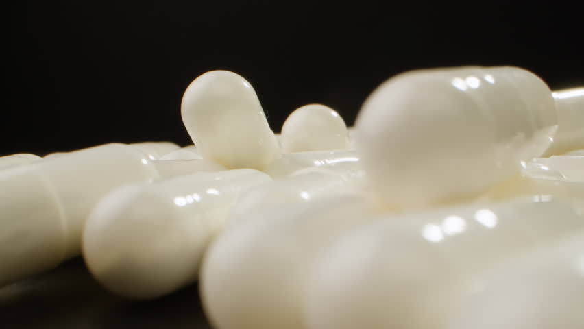 Pills and vitamins macro, Close up view of womans hands holding plenty of different drugs. Painkillers and antibiotics. Healthcare and medicine concept