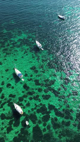 Island Aegina, Greece - May 4th, 2025 - footage of the capital of Aegina. Temples, landmarks, coastline, yachts, port and views to Saronic gulf
