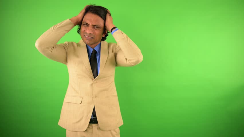Tense Professional Faces Pressure also Rage, Businessman Shows Stress and Anger Clutching His Head, Corporate look battling exhaustion with irritation, Guy wearing suit lost in distress plus agitation