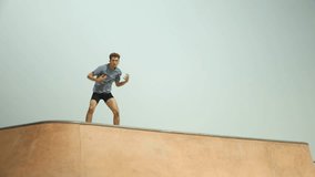 Parkour performer balancing on rooftop edge, executing dynamic moves with precision, showcasing urban sport skill and physical prowess against cityscape background - Powered by Shutterstock - Get 15% off with code: PIKWIZARD15