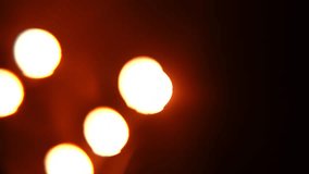 A warm-toned abstract blur image featuring a captivating lens flare effect, emanating a calming atmosphere. Slow motion. - Powered by Shutterstock - Get 15% off with code: PIKWIZARD15