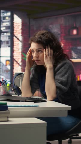 Vertical Video Devastated sad woman losing financial value on stock trading platform, crying and feeling stressed following market data trends. Worried overwhelmed investor deals with monetary losses