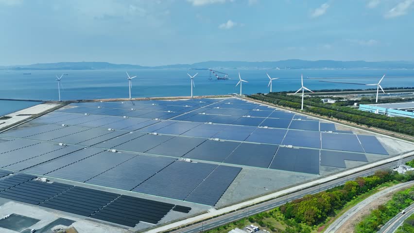 Aerial view of a hybrid wind and solar power plant