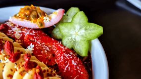 Healthy breakfast passion fruit topped oat granola cereal mango banana strawberry aniseed - Powered by Shutterstock - Get 15% off with code: PIKWIZARD15
