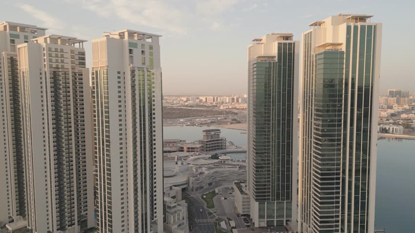 Abu Dhabi, UAE - 25th april, 2025: Aerial panorama Modern UAE skyline, luxury skyscrapers and office towers, showcasing business hubs, real estate growth, futuristic urban development in Middle East