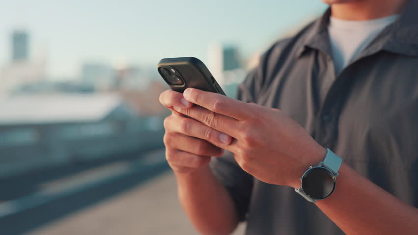 City, hands and chat with smartphone for fitness, workout website and online communication. Closeup, person and runner on break with mobile, exercise application and social media app for reel comment