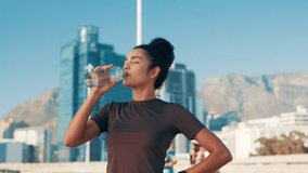 City, woman and fitness with drinking water for health, nutrition and break for marathon challenge. Outdoor, female person and runner with thirst for h2o liquid, hydration and wellness after workout - Powered by Shutterstock - Get 15% off with code: PIKWIZARD15