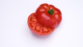 4K video of tomato cut in half and turned on white background.
Repeat playback available. - Powered by Shutterstock - Get 15% off with code: PIKWIZARD15