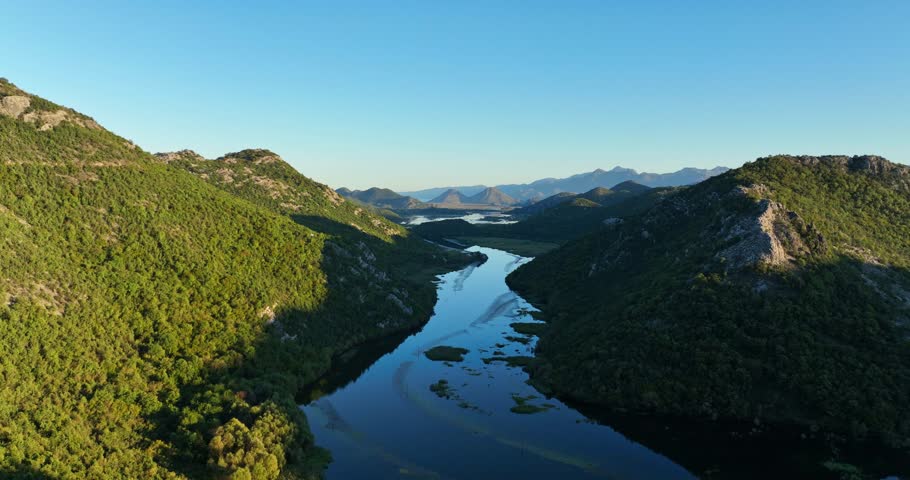 Skadar Lake - A Stunning Freshwater Lake Surrounded by Lush Mountains and Rich Wildlife, Located on the Border of Montenegro and Albania - Aerial Drone Shot