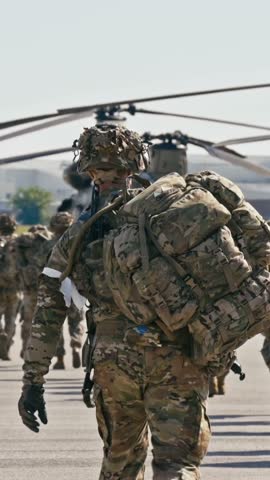 Vertical Footage Paratroopers preparation for a large-scale