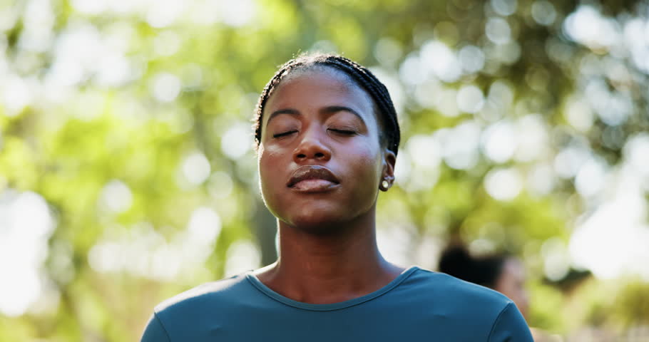 Meditation, wellness and woman with breathing by park for mindfulness, healing aura and spiritual mental health. Zen, face and black person in nature with fresh air and peaceful for energy balance