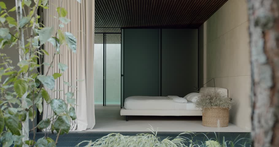 Contemporary bedroom in a minimalist style featuring sleek interiors and natural plant decorations. Perfect blend of comfort and modern aesthetics. Modern Minimalist Bedroom With Natural Elements