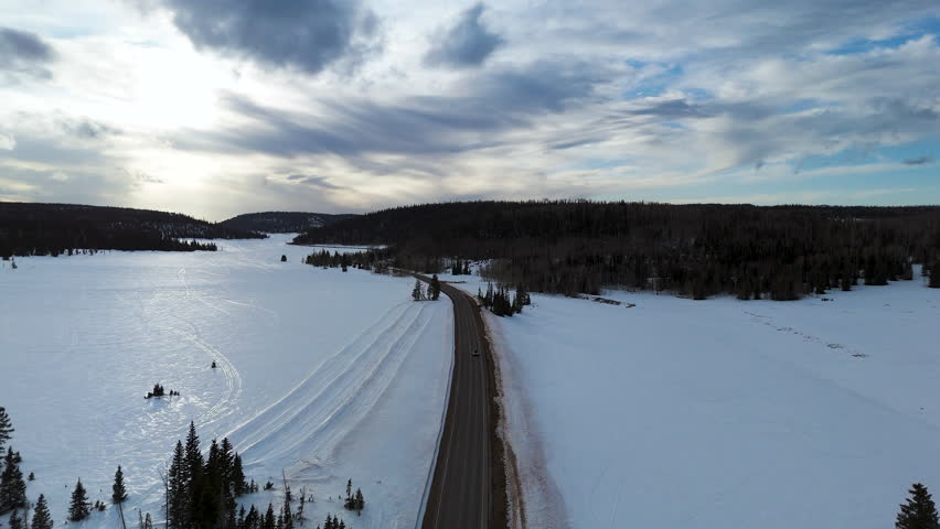 Cinematic aerial shot of wintery landscape in Utah, USA