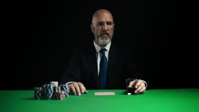 Nervous businessman raising his bet and pushing poker chips, drinking whiskey - Powered by Shutterstock - Get 15% off with code: PIKWIZARD15