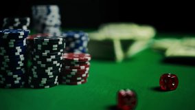 Poker chips, cash, dice, and laptop on green table, online casino, setup scene - Powered by Shutterstock - Get 15% off with code: PIKWIZARD15