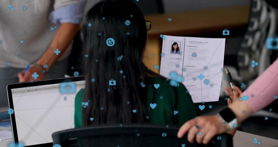 Candidate holding CV and pointing pen at business office desk, displaying digital heart icon. Professional, collaboration, innovation, technology, corporate, digital, teamwork