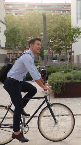 Business man going to work on bicycle. Urban Eco Sustainable transport in the city 