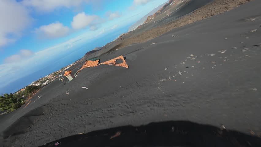 Volcanic ash covering houses and landscape in La Palma, Canary Islands, after Cumbre Vieja volcano eruption that destroyed thousands of buildings