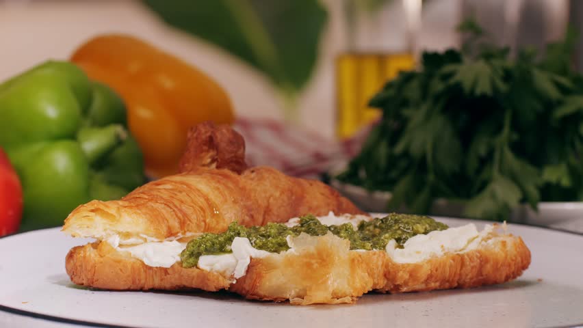  Croissant with jamon ham, Salmon, in Modern Cafe, Top View of Healthy Breakfast in Cafe. English breakfast: fried egg, bacon toast on sandwich.