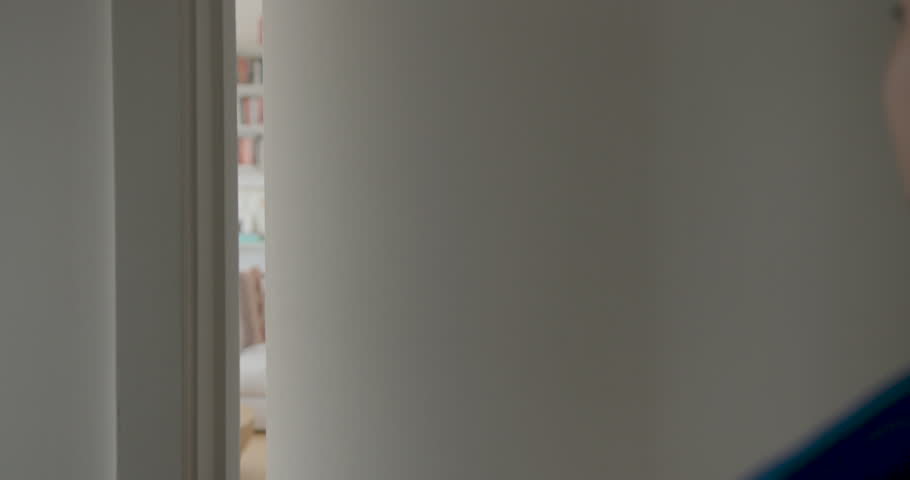 Woman Receiving a Package at Her Doorstep