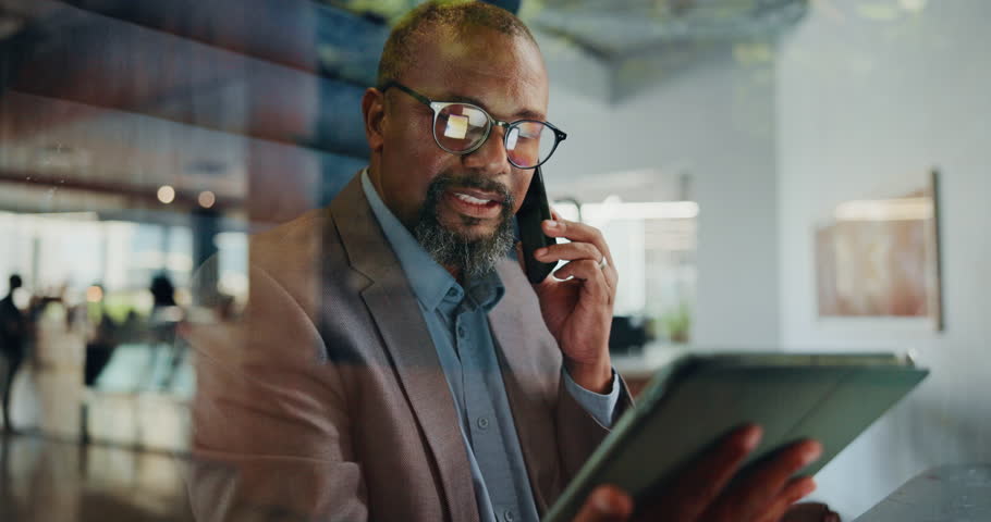 Phone call, office and business man on tablet for discussion, contact and finance consulting. Corporate, professional and worker on smartphone for communication, financial planning and proposal deal