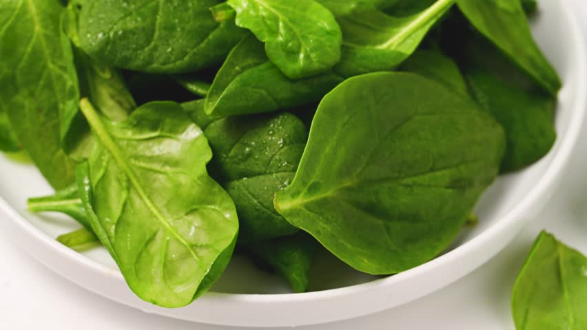Fresh spinach green leaves close up. Healthy food. Salad leaves