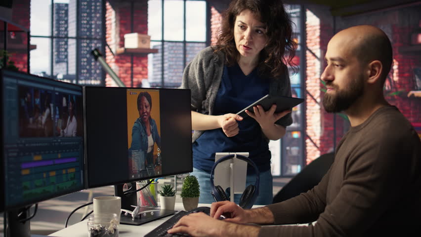 Professional editor uses AI powered software and PC reels in a creative office, marketing strategy used in targeting viral trends and boosting online followers and exposure. Camera A.