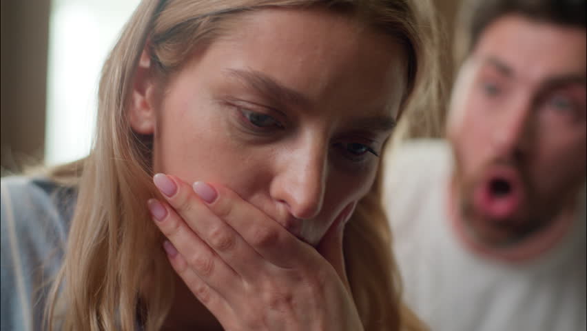 Stressed Caucasian family couple argument angry man shouting quarrel frustrated woman feeling upset husband lady arguing breakup at home bedroom divorce irritated guy screaming wife close up morning