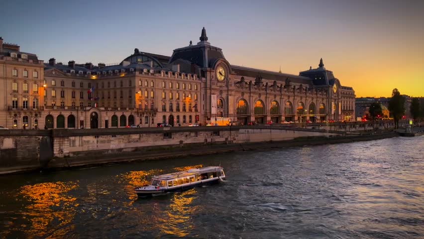 Seine River Bridge and Historic Buildings at Sunset in Paris